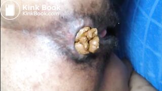 Hairy girl shitting an hard turd