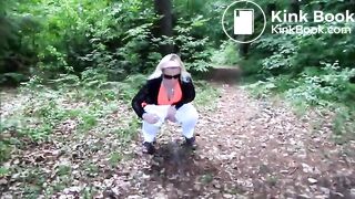 poop in the forest next to the road