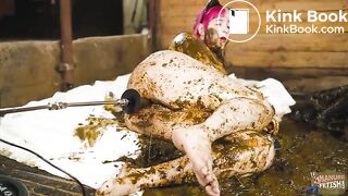 Catwoman Lyndra masturbates in cowshit