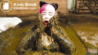 Catwoman Lyndra masturbates in cowshit
