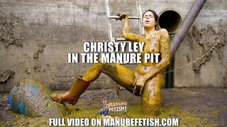 Christy Ley in the manure pit