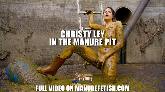 Christy Ley in the manure pit