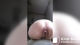 Girl shitting  very constipated turd