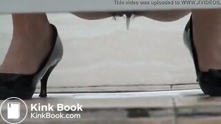 Sexy woman drops her jizz and a big turd in a public toilet