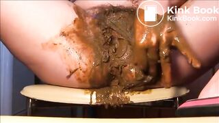 Woman fisting herself with a lot of shit