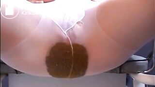 Woman shitting a big diarrhea on white pantyhose