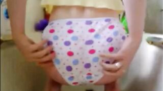 Girl shitting on panty and smearing it on butt