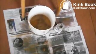 Girl shitting enema and diarrhea from a chair