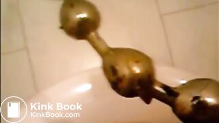Girl shitting in the toilet and inserting dildo on her asshole