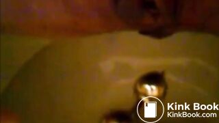 Girl shitting in the toilet and inserting dildo on her asshole