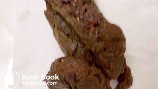 August Four Loads on Toilet Seat!