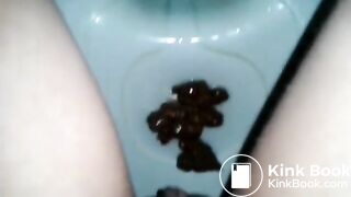 Girl shitting  very hard constipated  turd