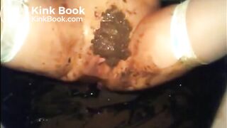 Hot babe is doing a big diarrhea and masturbating with shit