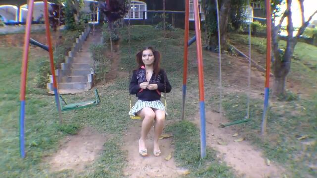 Naughty girl shitting at the playground