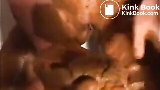Woman shitting and smearing shit on her body