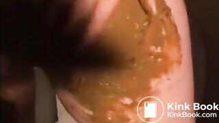 Woman shitting and smearing shit on her body