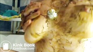 Big woman is smearing shit on her breast