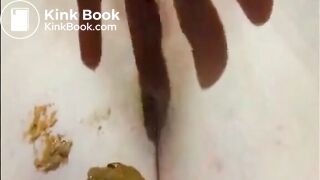Shaved girl shitting closeup and fingering her pussy
