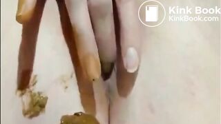 Shaved girl shitting closeup and fingering her pussy
