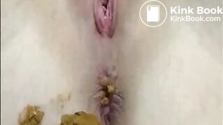 Girl shitting and fingering her asshole