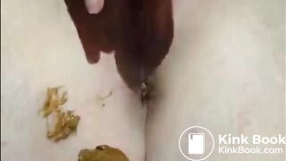 Girl shitting and fingering her asshole