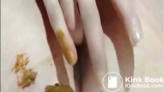 Girl shitting and fingering her asshole