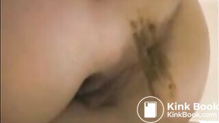 Milf is shoving her pulsating asshole with shit