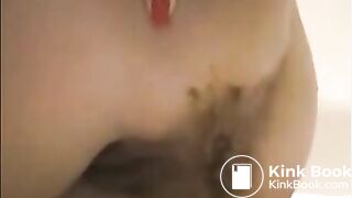 Milf is shoving her pulsating asshole with shit