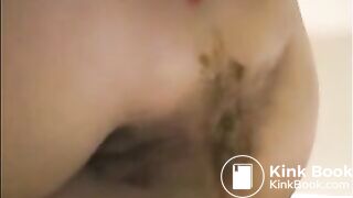 Milf is shoving her pulsating asshole with shit