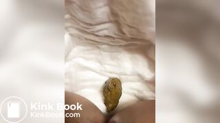 Hairy girl poops on the diaper
