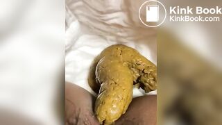 Hairy girl poops on the diaper