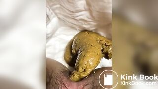Hairy girl poops on the diaper