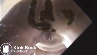 Woman shit and piss on a mirror table