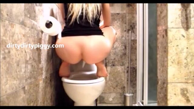 Hot butt blonde shitting a lot in the toilet