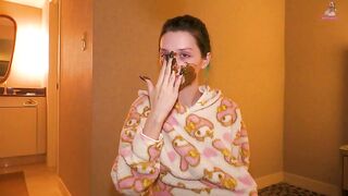 Rubbing scat on my face!