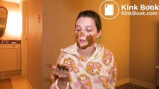Rubbing scat on my face!