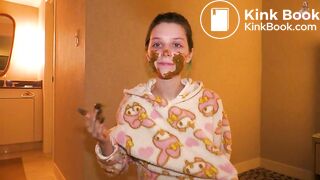 Rubbing scat on my face!
