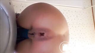 Petite babe shitting a huge turd