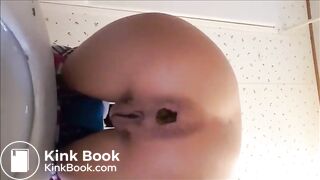Petite babe shitting a huge turd