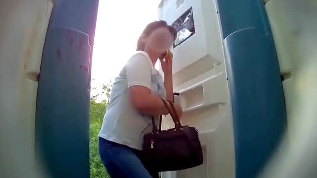 Unsuspecting Woman Caught Taking A Shit In A Porta-Potty