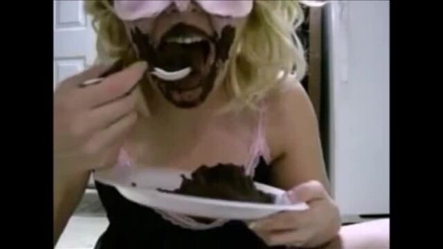 Masked blonde eating her own shit