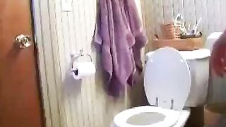 Girl pooping on the toilet