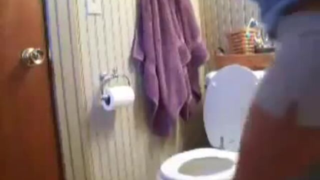 Girl pooping on the toilet