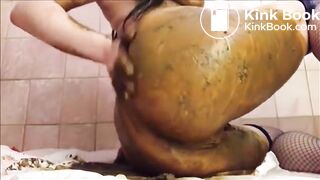 Brunette in fishnet smearing shit