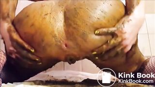 Brunette in fishnet smearing shit