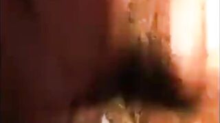 Woman shitting and smearing shit on her body