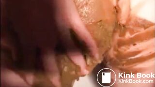 Woman shitting and smearing shit on her body