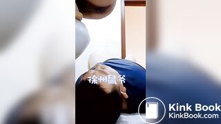 chinese escort feeding a pig