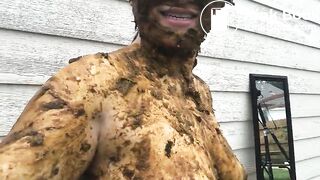 Asian woman smiles covered in scat