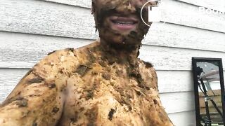 Asian woman smiles covered in scat